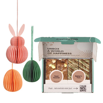 honeycomb hanger groen, roze en perzik met paasbox op witte achtergrond