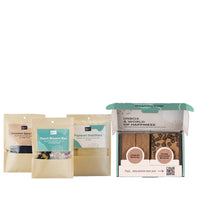 Browniebox met twee double chocolates brownies en 2 originals brownies. Twee zakjes thee en een zakje met theezakjes. 